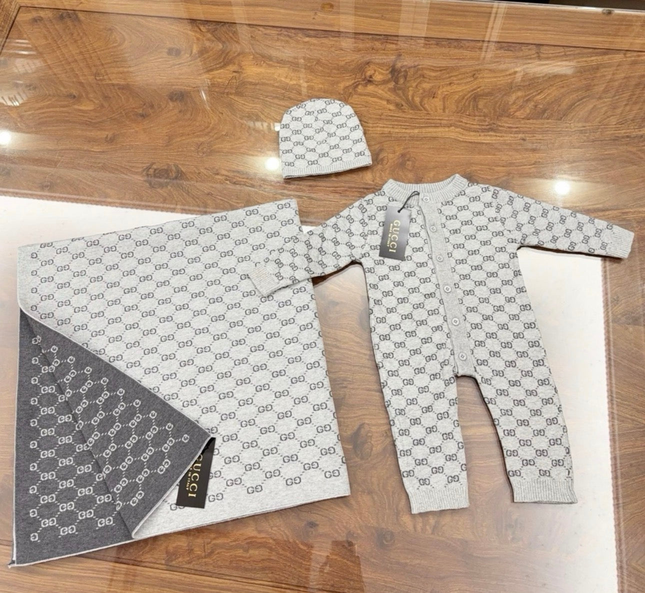 Grey baby grower and blanket