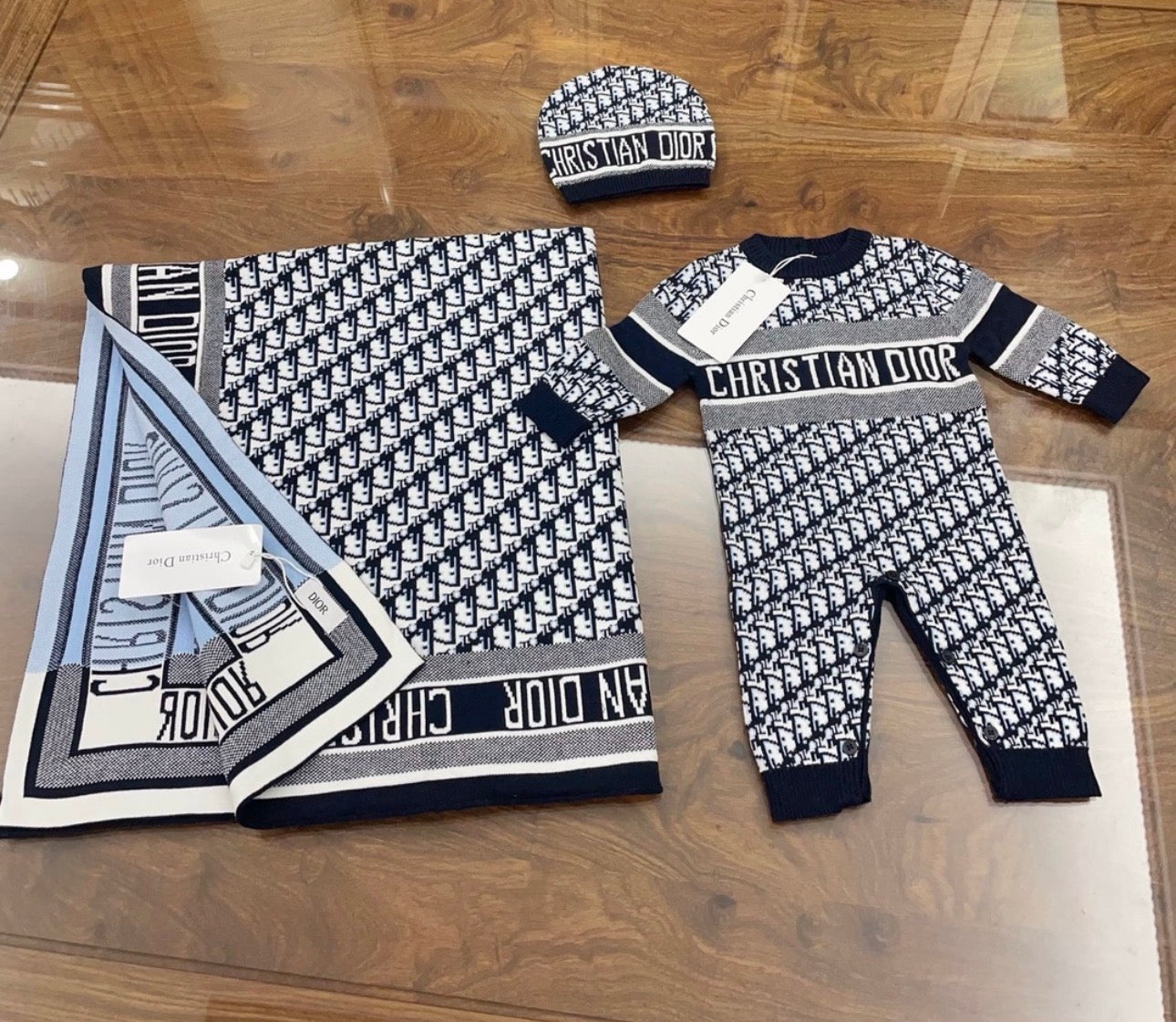 Classic Dior romper and blanket