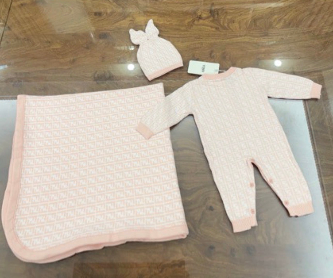 Pink baby grower and blanket