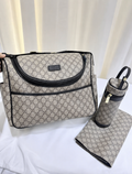 Beige and black baby bag